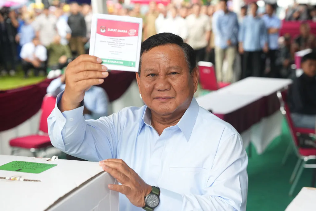 Prabowo Subianto, presidential candidate and Indonesia’s defense minister, casts his ballot at a polling station in Bojong Koneng village, West Java, Indonesia, on Feb. 14, 2024