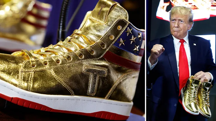 Former President Donald Trump holds a pair of Trump signature shoes after taking the stage at Sneaker Con at the Philadelphia Convention Center on February 17, 2024, in Philadelphia, Pennsylvania.