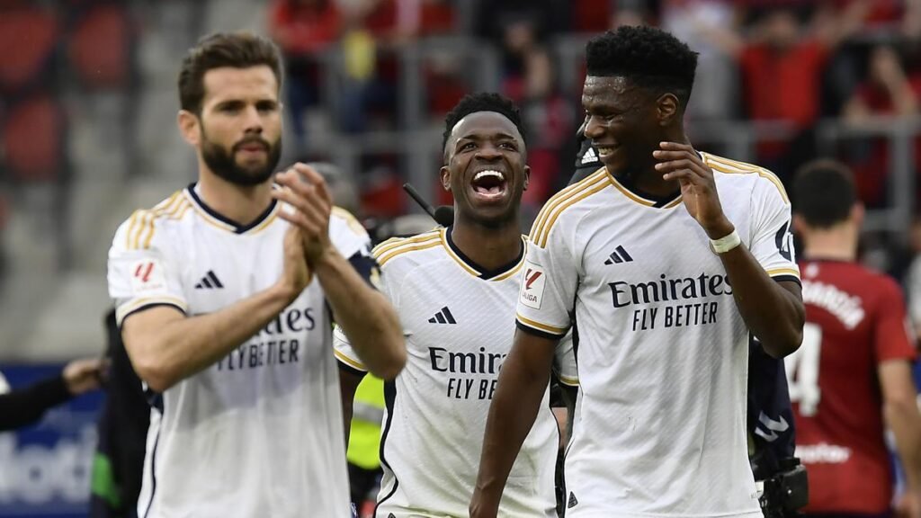 Real Madrid’s Nacho, from left, Vinicius Junior, and Aurelien Tchouameni celebrate after the Spanish La Liga match between Osasuna and Real Madrid at the El Sadar stadium in Pamplona, Spain, Saturday, March 16, 2023. | Photo Credit: AP